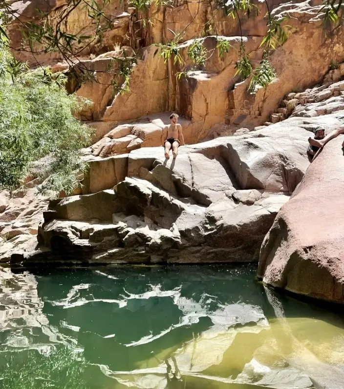 A Bedouin guide resting after completing a Sinai trekking route up Mount Bab El-Donya