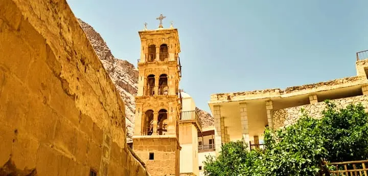 Top 10 things to do in Sinai in 2025 Interior of the Church of Saint Helena within Saint Catherine Monastery, showing ancient icons, candlelit altars, and stone walls that reflect centuries of religious history and spiritual significance.