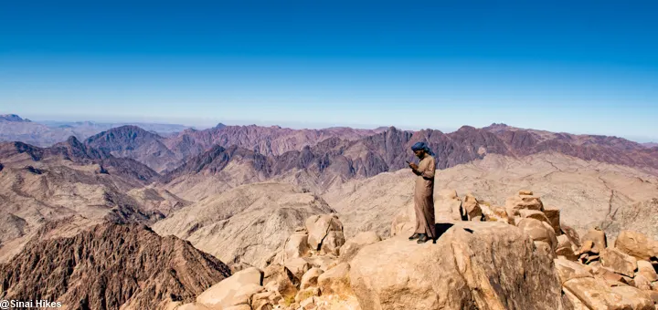 Bedouin guide hiking on Mount Umm Shomar in the Sinai Mountains.